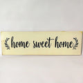 Carved wooden wall hanging ornament in black or white measuring 40cm long for home decoration