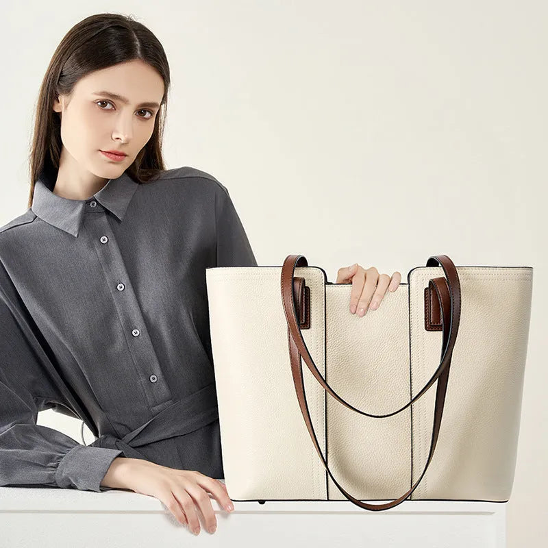 Women's genuine leather crossbody commuter bag with multiple interior compartments in horizontal square design