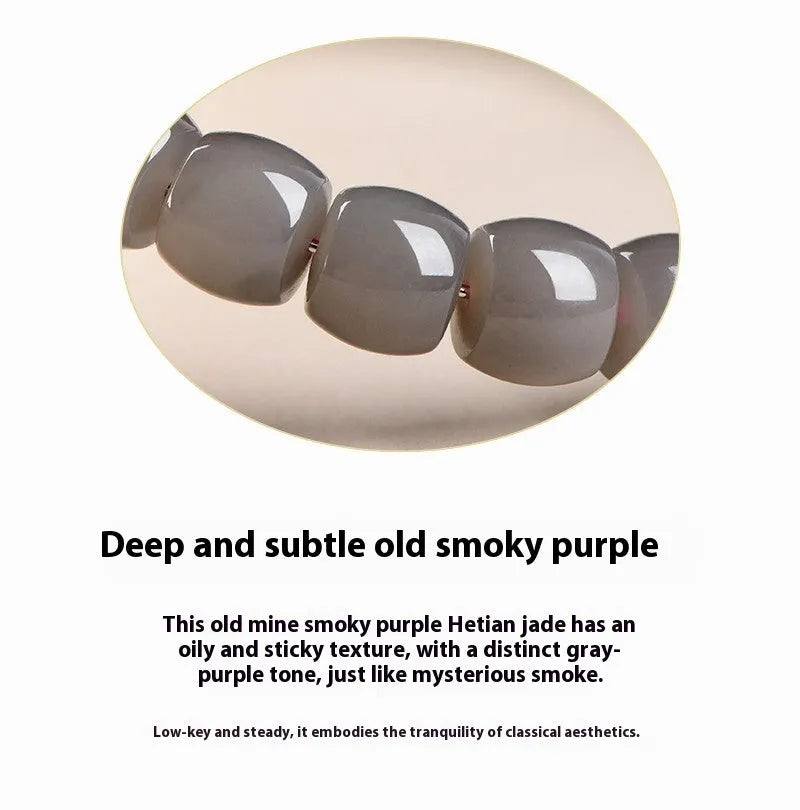 Straight cut smokey violet Hetian jade bracelet with approximately 24 beads measuring 8x9mm.