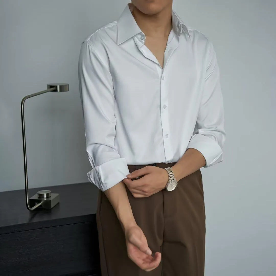 Men's black long sleeve Korean style cardigan shirt with slim fit and loose cut on a model.