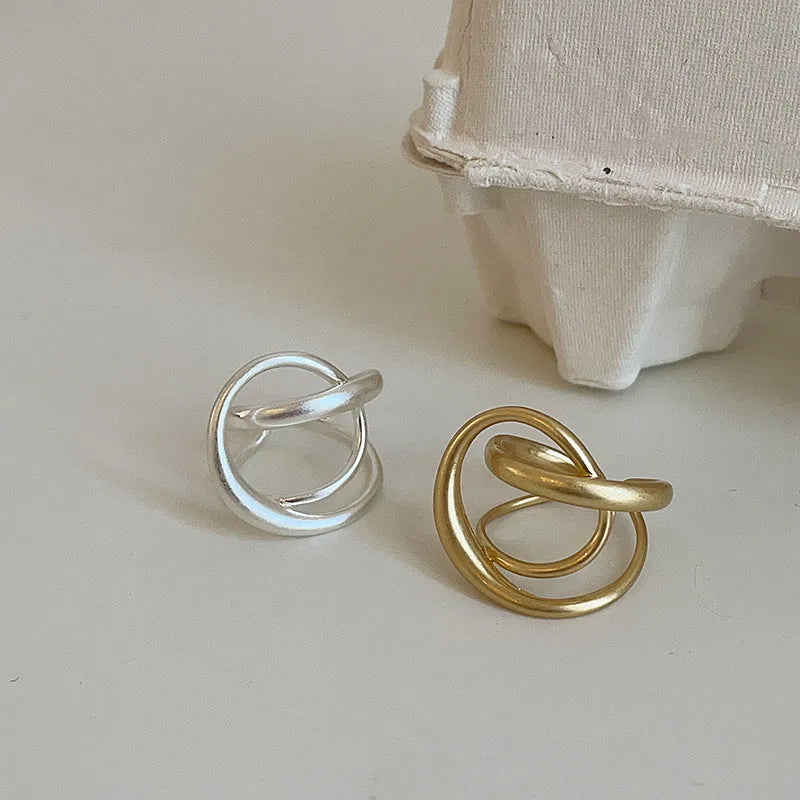 Geometric interlaced matte metal open ring for women in gold or silver electroplated finish