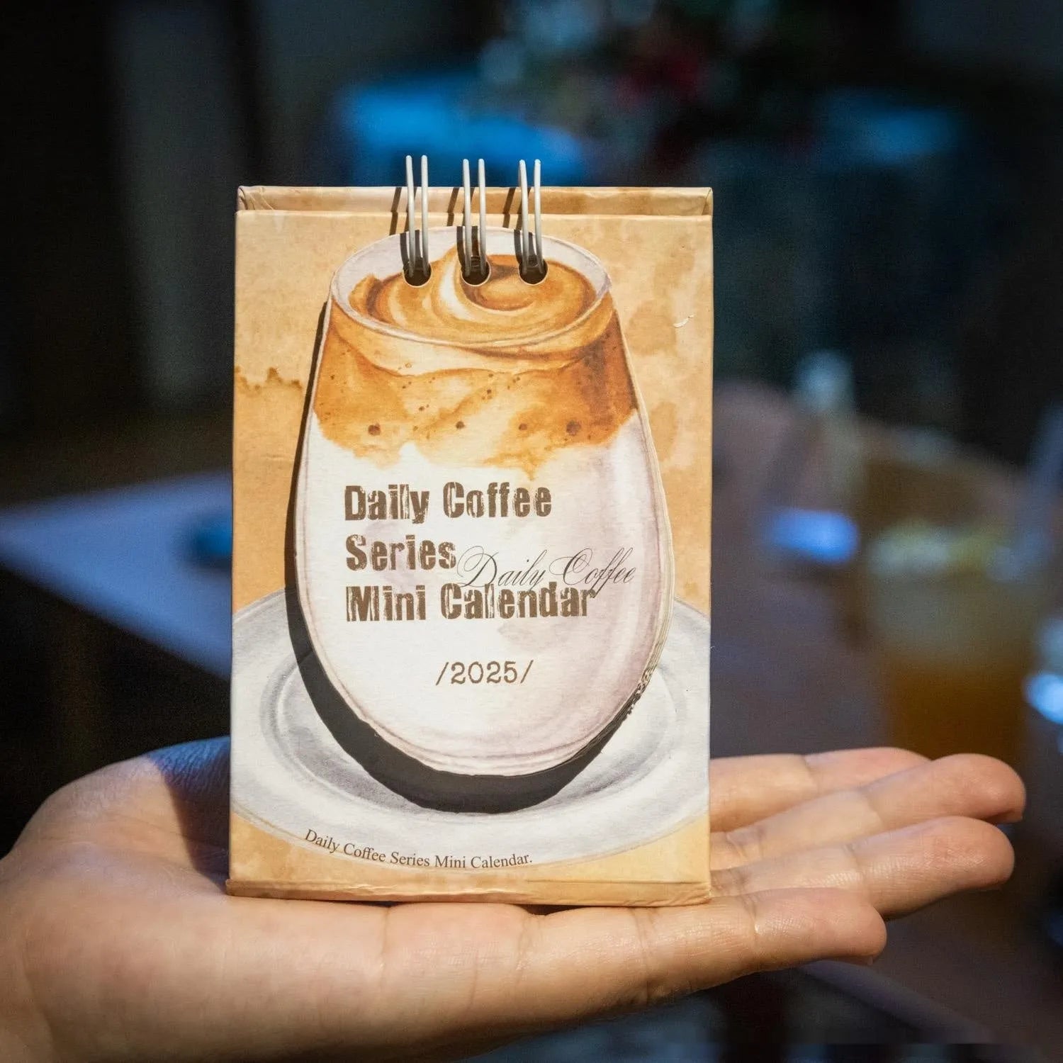 Coffee mini desk calendar 2025 showing modern paper design with monthly date display