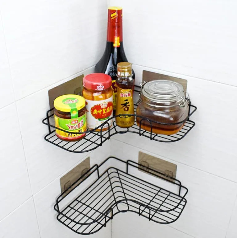 Punch-free iron single-layer corner rack for bathroom and kitchen storage in white or black with suction stickers.