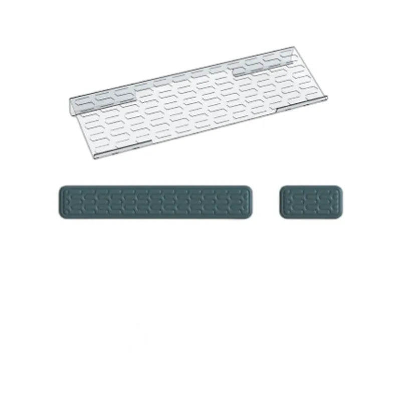 Double-sided black resin keyboard and mouse desk pad with integrated memory foam wrist rest.
