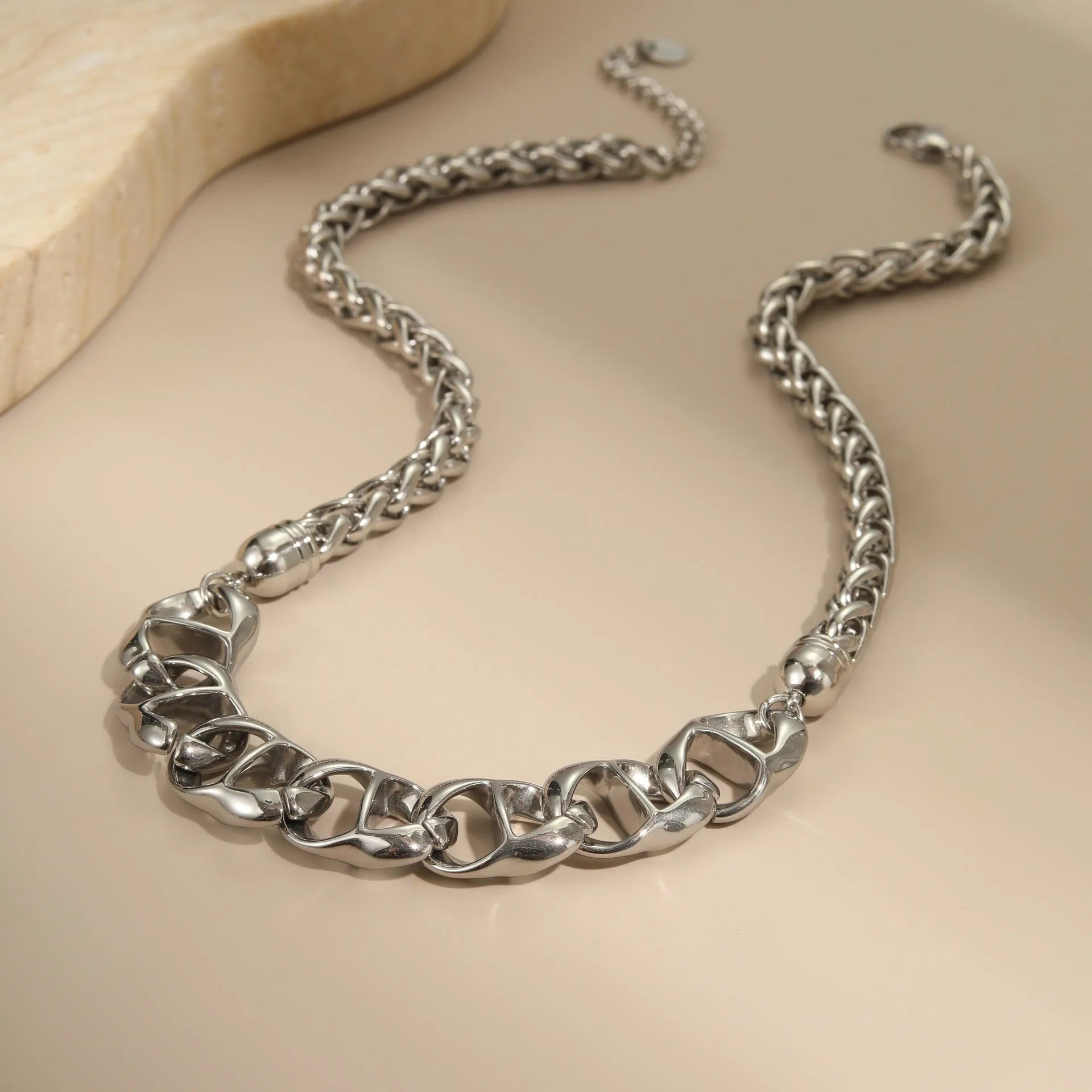Gold plated stainless steel necklace with geometric pendant on regular chain