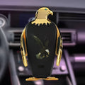 Car phone holder with wireless charging base and suction cup mount in black and gold colour with eagle design.