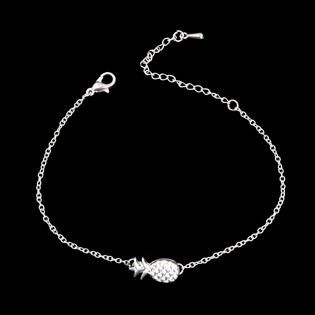 Gold or silver alloy bracelet with a small pineapple charm on an adjustable chain.