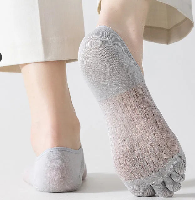 Modal cotton five-finger ultra-thin boat socks in solid colours on a white background.
