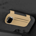 Genuine cowhide leather car sun visor holder with clip for sunglasses, shown in a selection of colours.