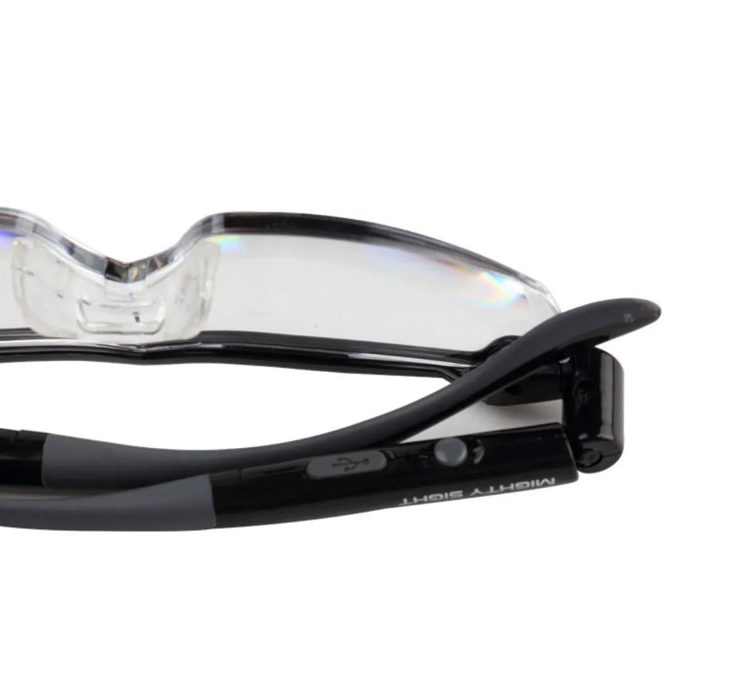 Transparent black USB LED reading glasses with integrated lighting and ABS frame