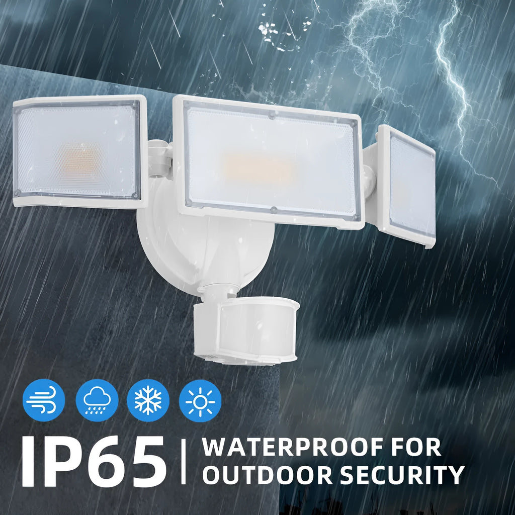 White outdoor LED security flood light with motion sensor mounted on a wall.