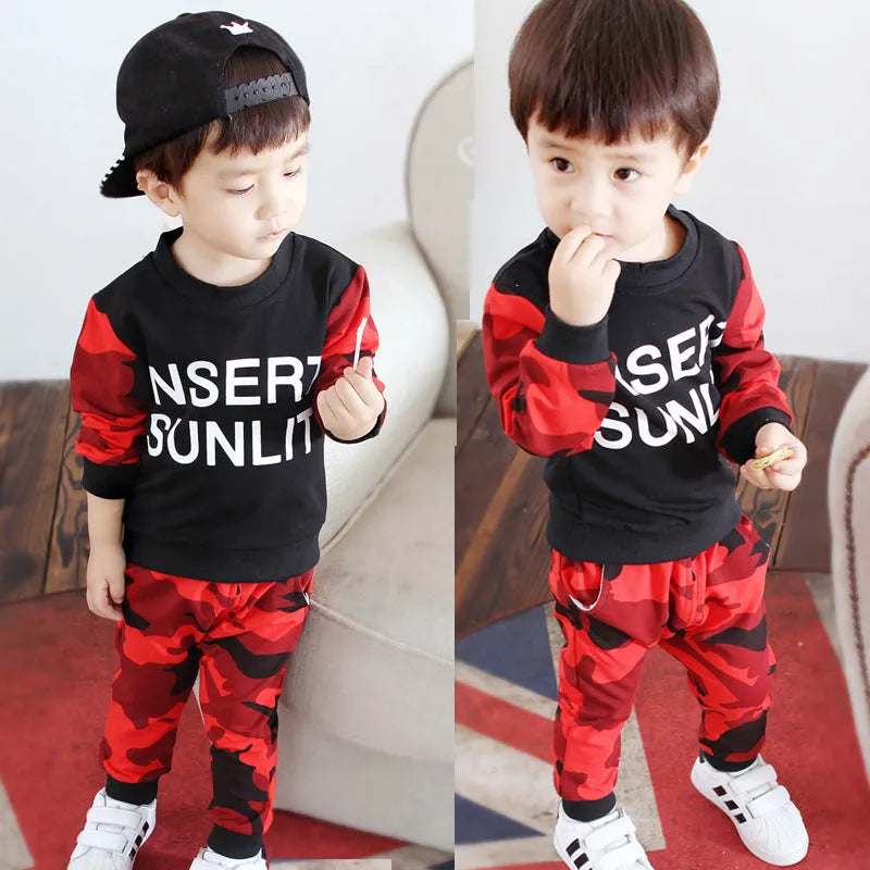 Boys' cotton top in green or red, 90% cotton, sizes 80cm to 120cm for heights 75cm to 110cm.