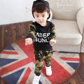 Boys' cotton top in green or red, 90% cotton, sizes 80cm to 120cm for heights 75cm to 110cm.