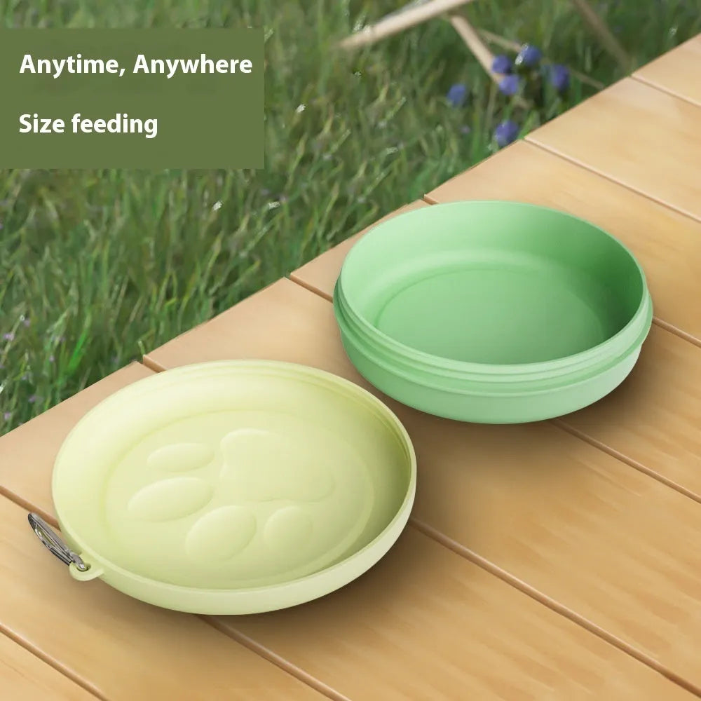 Collapsible portable dog food bowl shown in pink and green colour options
