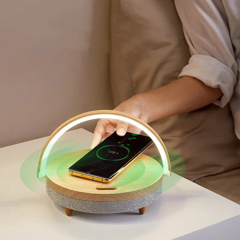 White wireless charging LED night light with Bluetooth speaker and phone holder in marble pattern finish