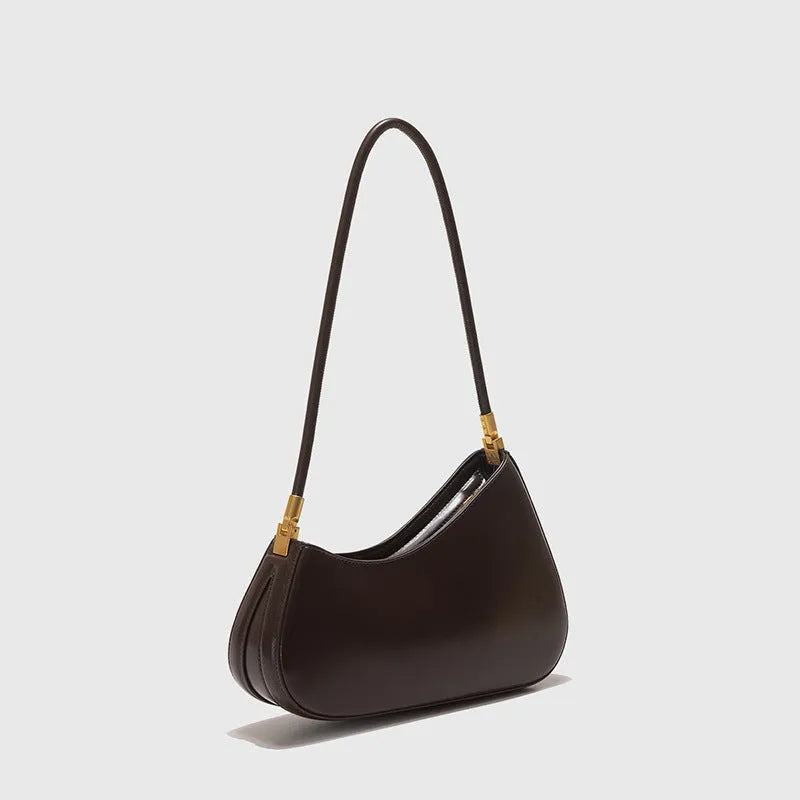 Retro oval women's underarm shoulder bag in PU leather with single strap and zippered interior