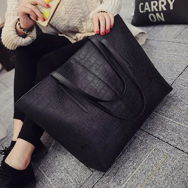 European-style women's shoulder bag handbag in simple design, shown in black and grey colour options