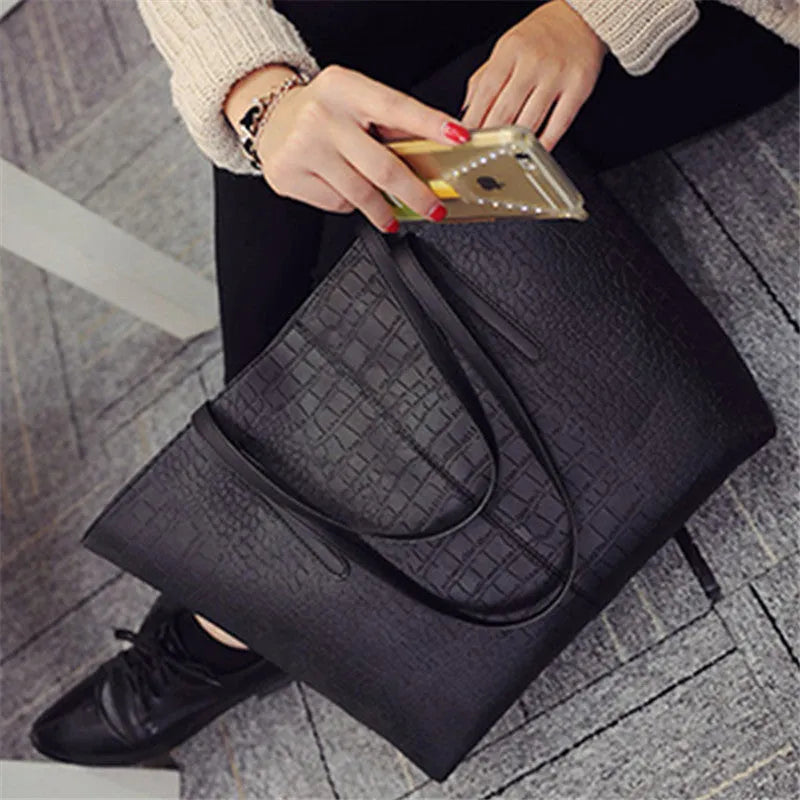 European-style women's shoulder bag handbag in simple design, shown in black and grey colour options