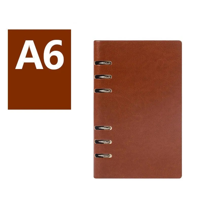 Loose-leaf notebook with imitation leather cover in red blue black brown seaweed green colours