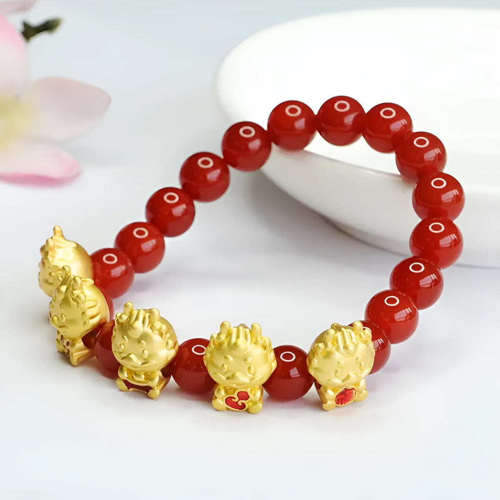 Natural red agate beaded bracelet with Chinese Five Blessing Dragon design on 8mm beads.