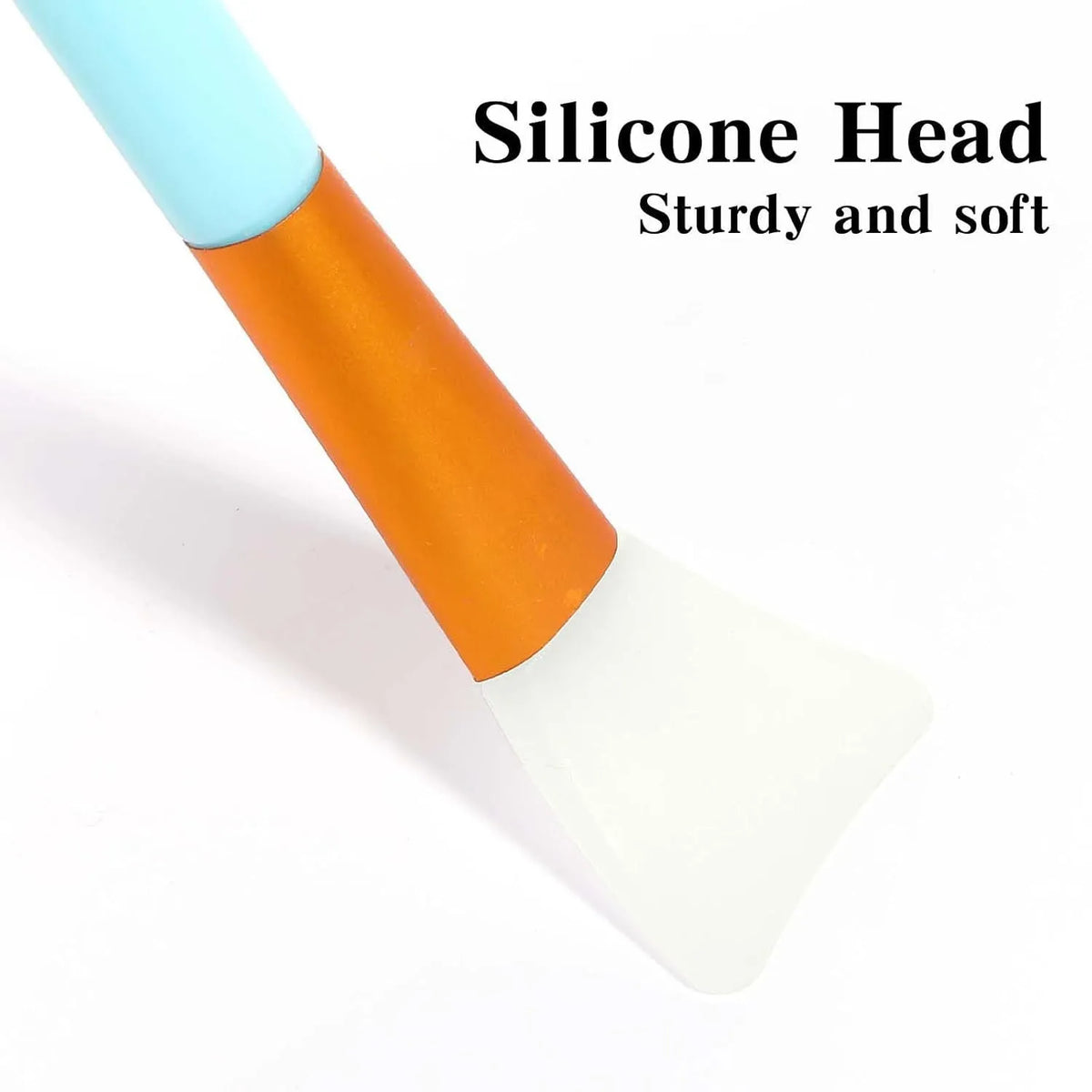 Reusable silicone spatula brush for applying clay and mud face masks, available in multiple colours.