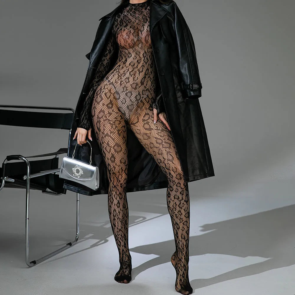 Black fishnet one-piece lingerie with long sleeves and a backless design on a mannequin.