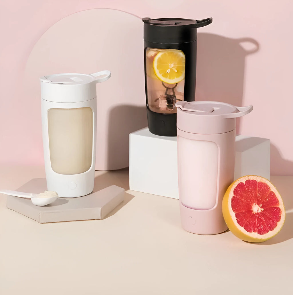 Portable juice blender with 650ml capacity in black blue pink or white featuring automatic mixing motor