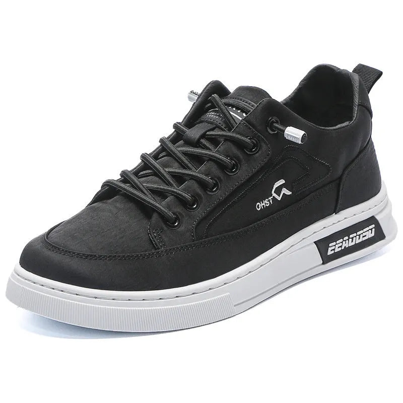 Grey men's canvas sneakers with round toe and lace-up design