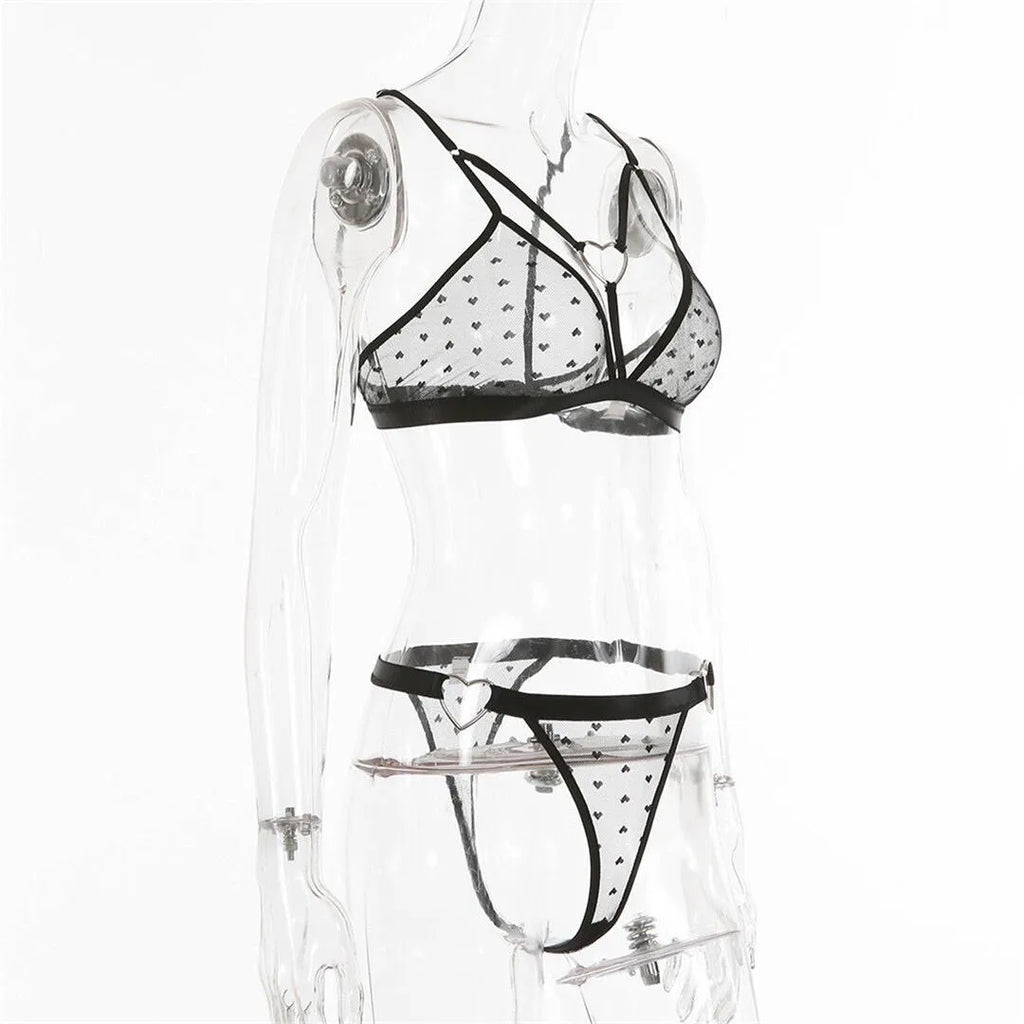 Ladies black mesh two-piece spandex set with matching top and leggings.