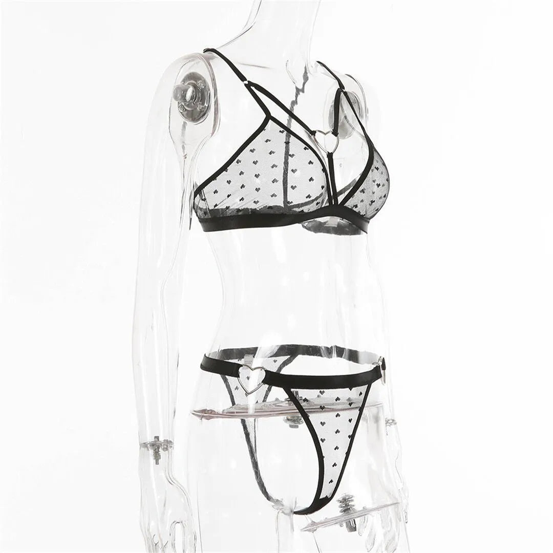 Ladies black mesh two-piece spandex set with matching top and leggings.