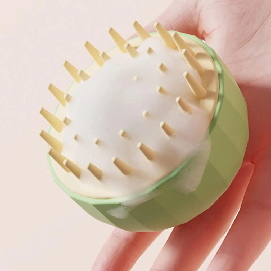 Green double-sided pet bath brush with massage function and drain holes for dog and cat washing