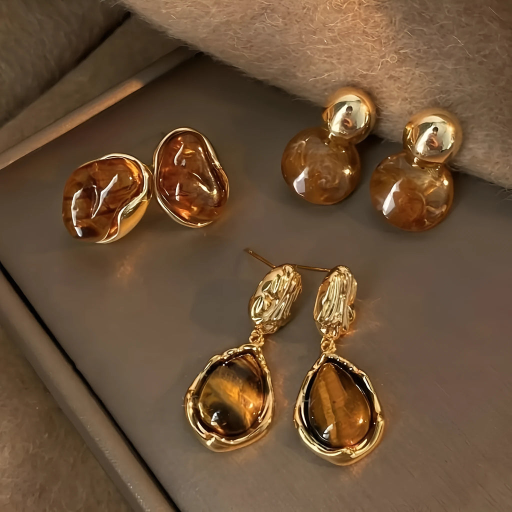 Handmade geometric earrings set with three styles including irregular, wafer and water drop shapes with tassel elements