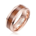 Men's tungsten ring with hair texture design in Ugyen, shown in rose gold and steel electroplated finishes.