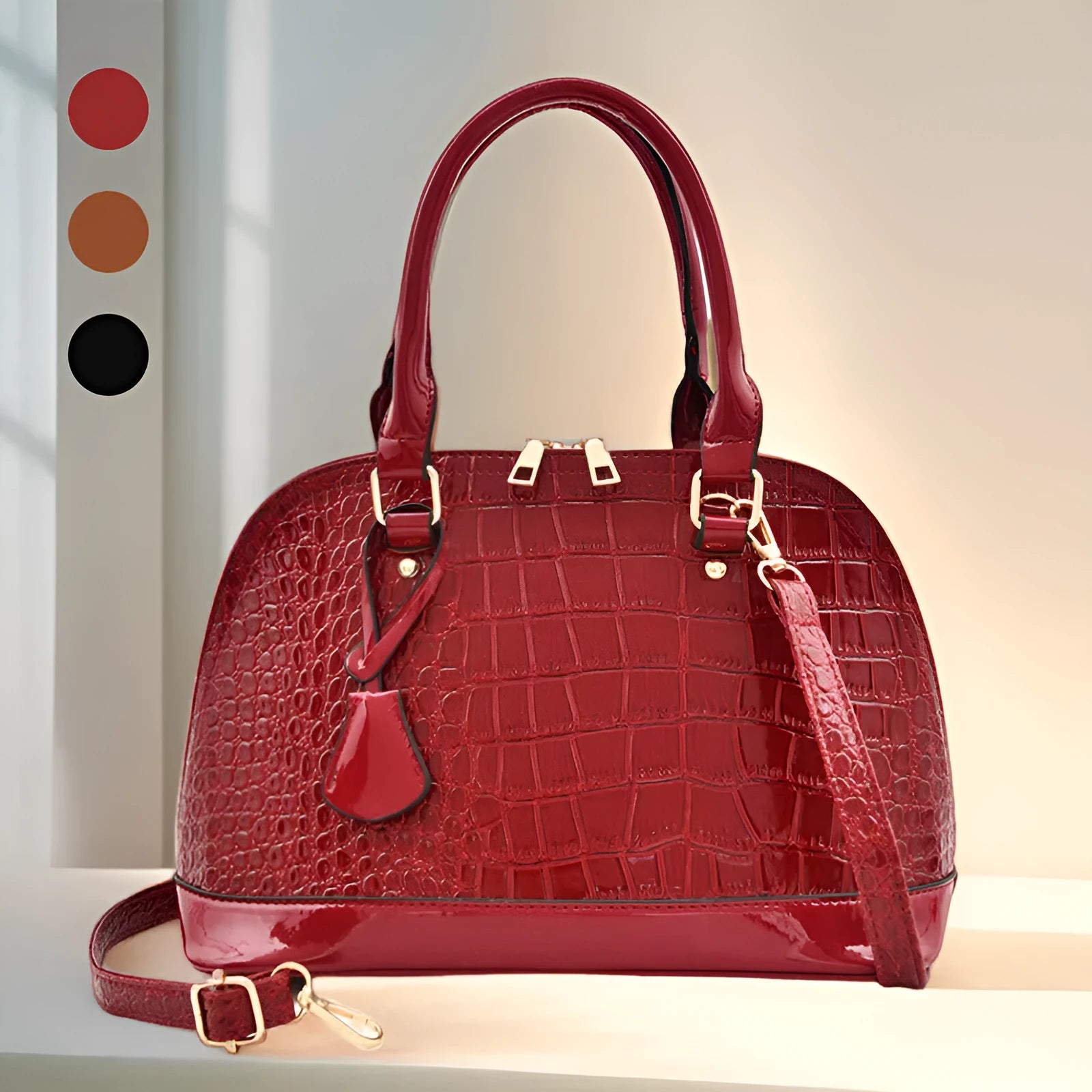 Shell-shaped shiny PU leather crossbody shoulder bag showing black, brown, and red colour options