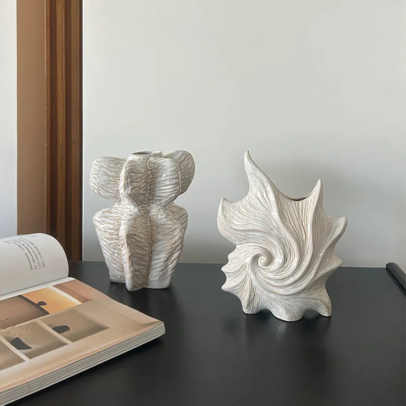 European retro style ceramic vase with a coloured glaze finish on a wooden table.
