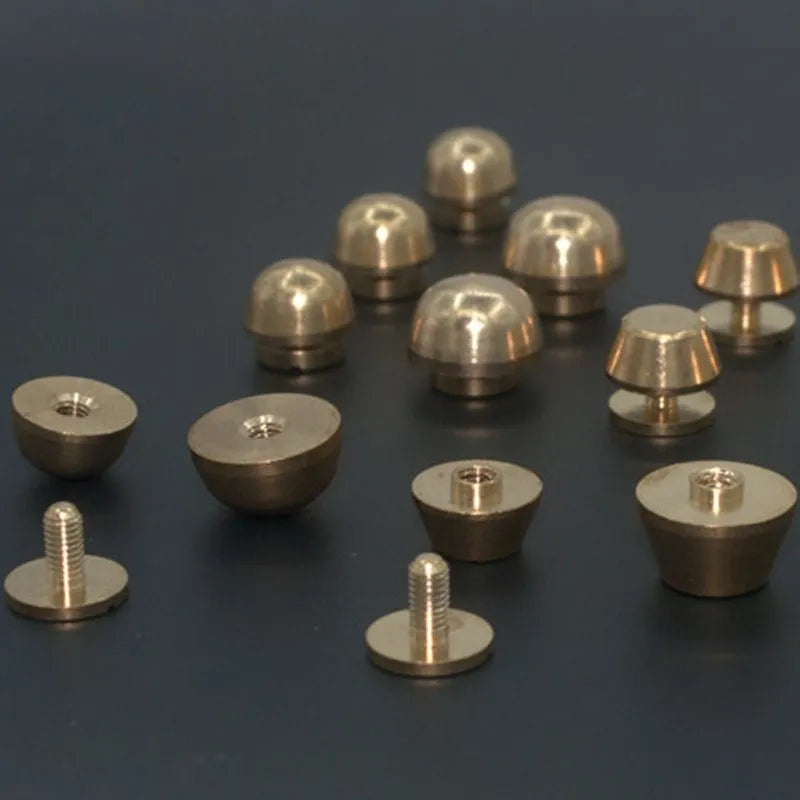 Brass decorative buckle foot nails in round and geometry bucket designs, sizes 10x6mm and 12x7mm.