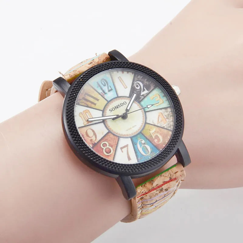 Women's vintage leather wrist watch with round dial and stainless steel buckle