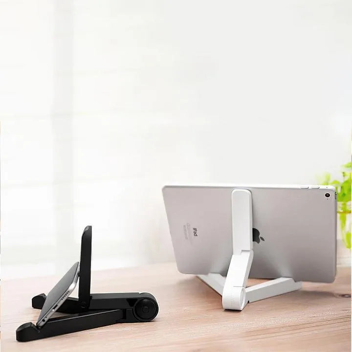 Black foldable tablet holder displaying a smartphone in landscape mode on a desk.