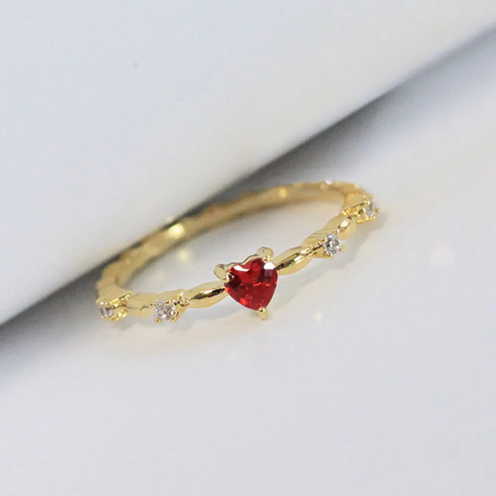 Personalised zircon peach heart ring in gold or silver electroplated finish on copper, available in UK sizes 6 to 10