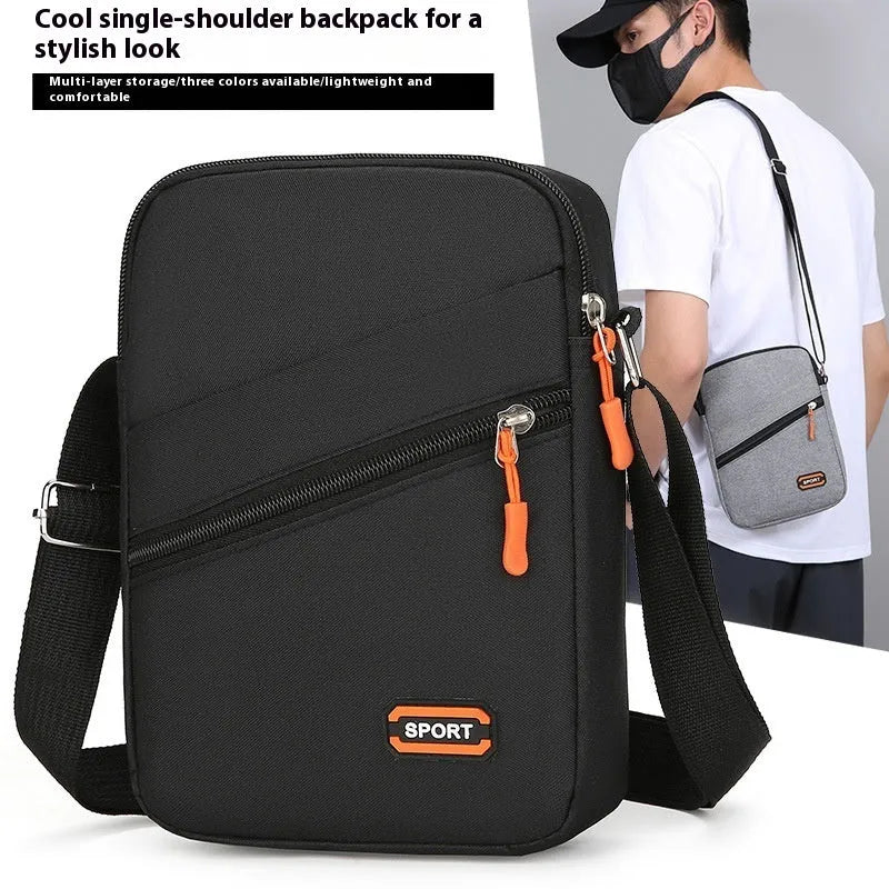 Oxford cloth crossbody commuter bag in solid colour with contrast design