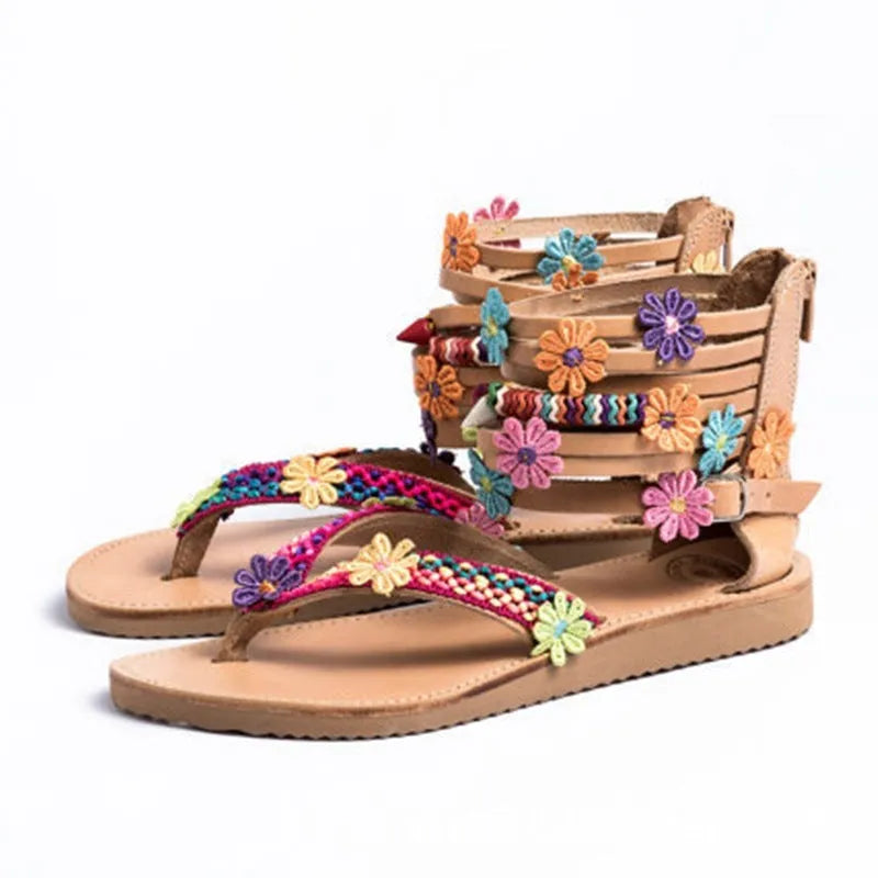 Ethnic style beaded petal floral sandals with artificial PU upper and round toe.