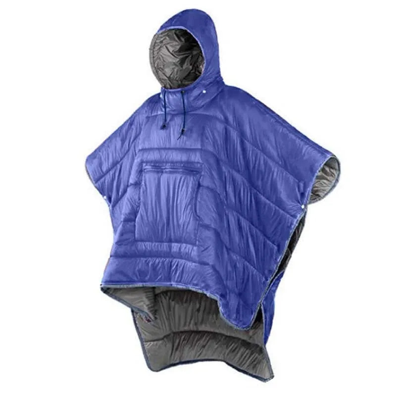 Adult wearing a gray hooded outdoor cloak that converts into a sleeping bag, shown laid flat at 200cm x 140cm.