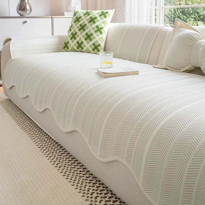 Special-shaped straight row mat cover in Ice Silk fabric on a sofa, showing non-slip design and light luxury style.