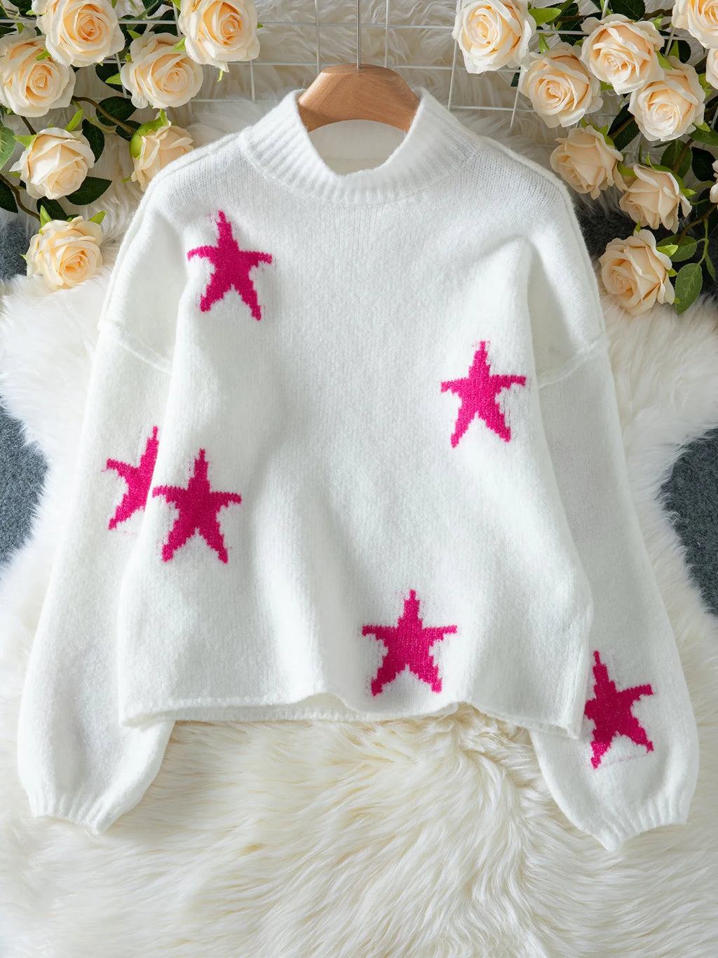 Women's white turtleneck pullover with five-pointed star pattern and loose fit design