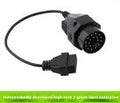 BMW 20-pin to standard 16-pin OBD2 diagnostic adapter cable on a white background.