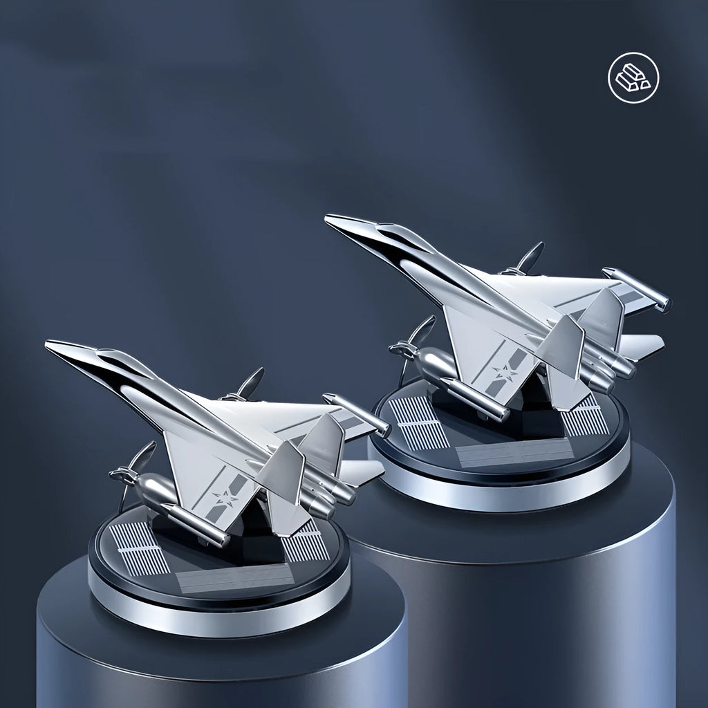 Silver solar powered rotating fighter aircraft perfume ornament with aluminium alloy seat.