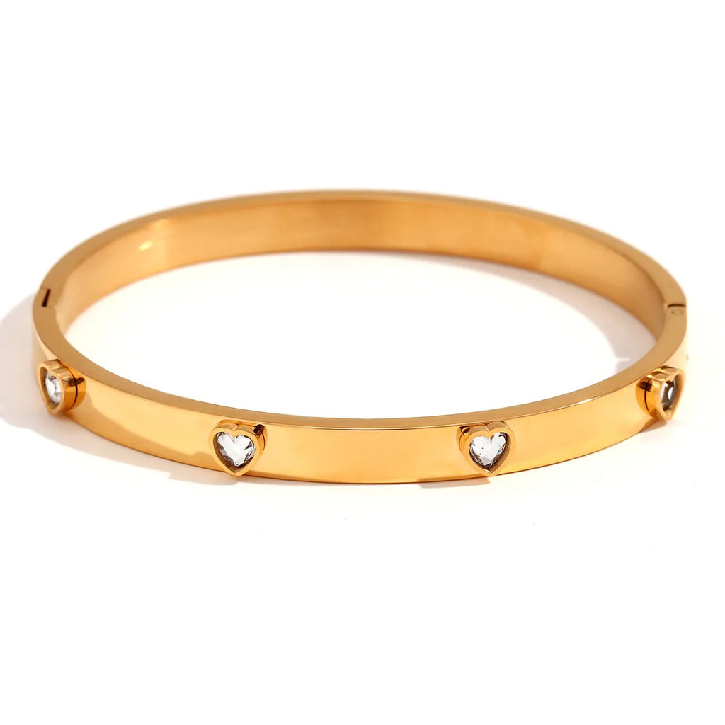 Stainless steel peach heart bracelet with micro-inlaid coloured stones in gold electroplated finish