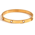 Stainless steel peach heart bracelet with micro-inlaid coloured stones in gold electroplated finish