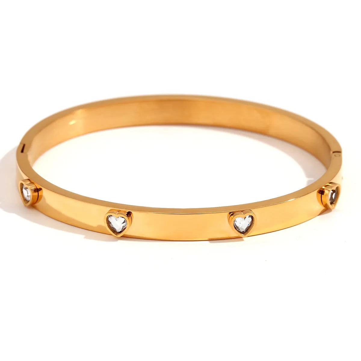 Stainless steel peach heart bracelet with micro-inlaid coloured stones in gold electroplated finish
