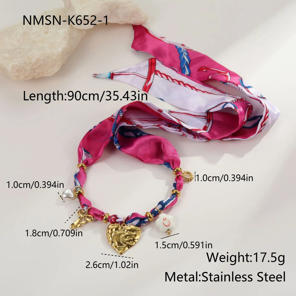 Geometric love pendant necklace and bracelet set in stainless steel with electroplated finish